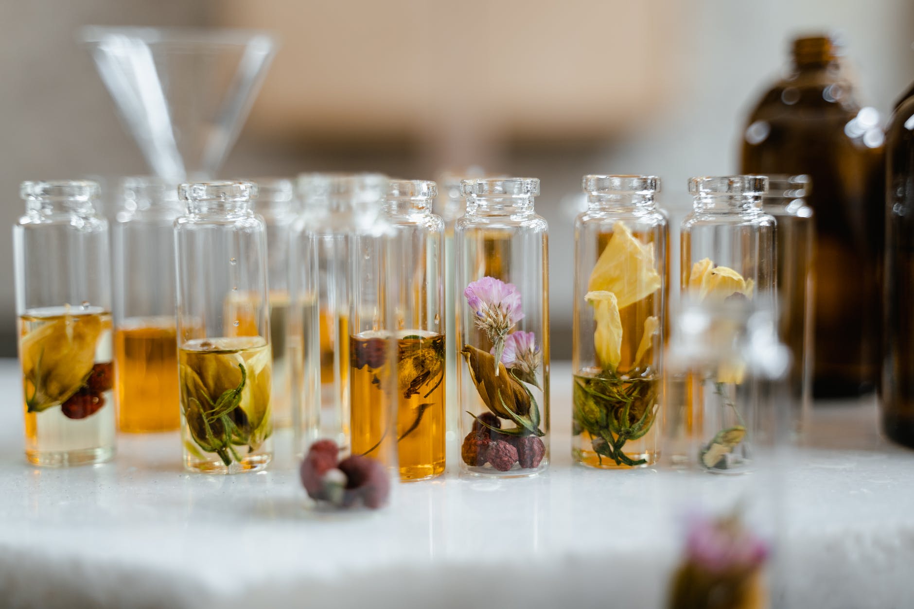clear glass bottles on white table